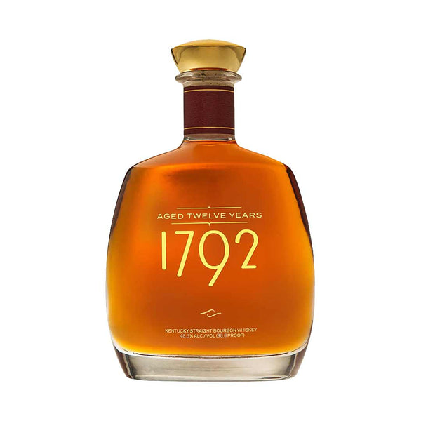 1792 12 Year Old bourbon bottle against neutral background.