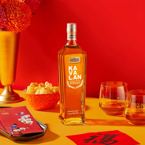 Kavalan Classic Single Malt with glasses, styled for Lunar New Year