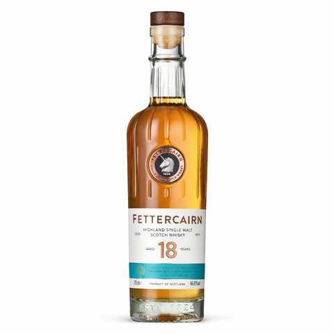 Fettercairn 18 Year Old Highland single malt Scotch whisky bottle against neutral background.