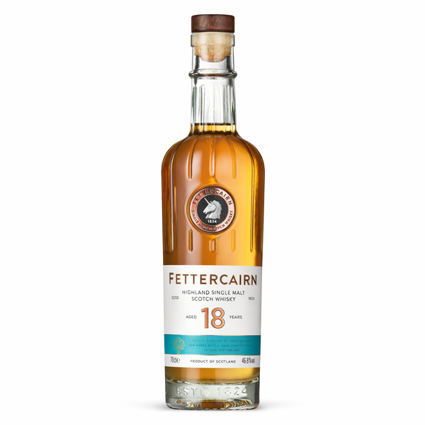 Fettercairn 18 Year Old Highland single malt Scotch whisky bottle against neutral background.