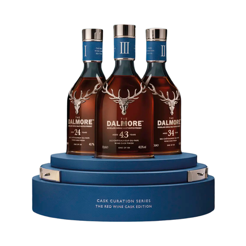 The Dalmore Cask Curation Series The Red Wine Cask Edition trio of single malt whiskies on presentation stand